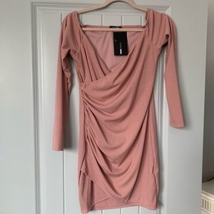 Off the shoulder low cut pink mini dress. Size M